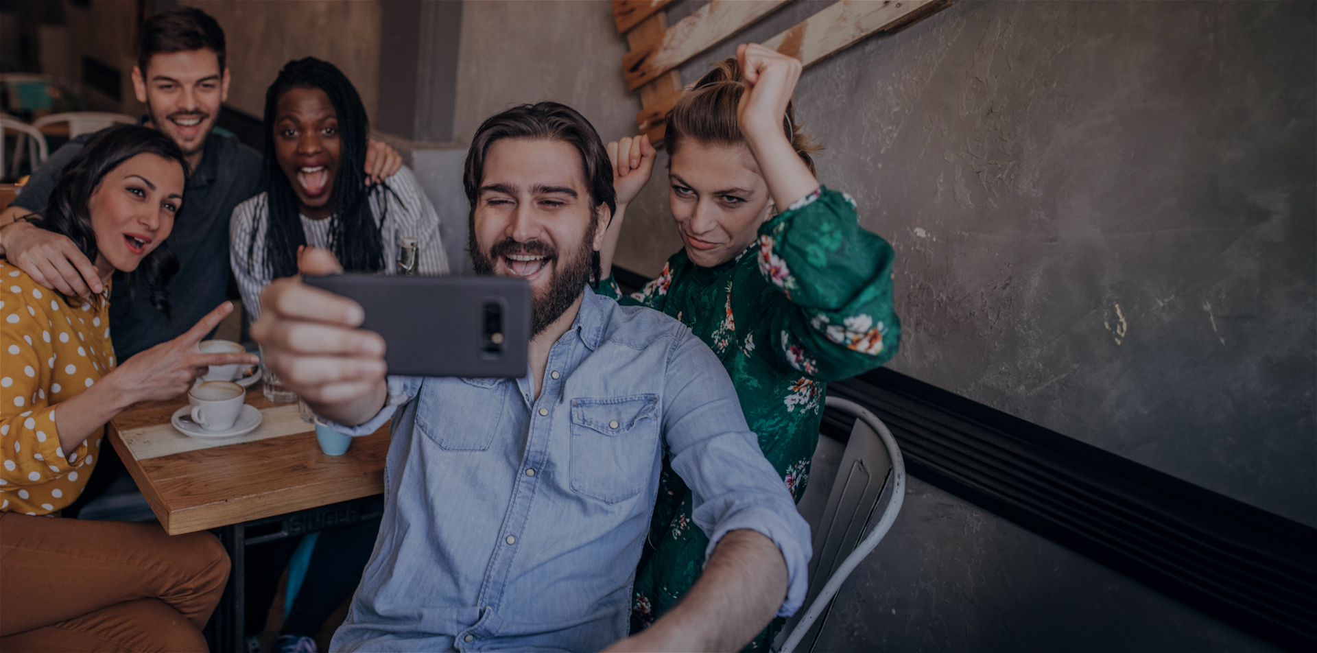 A group of young friends taking a selfie while they're out on the town